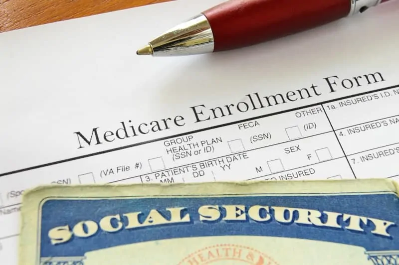 Social Security card and Medicare enrollment form to claim as the self-employed health insurance deduction
